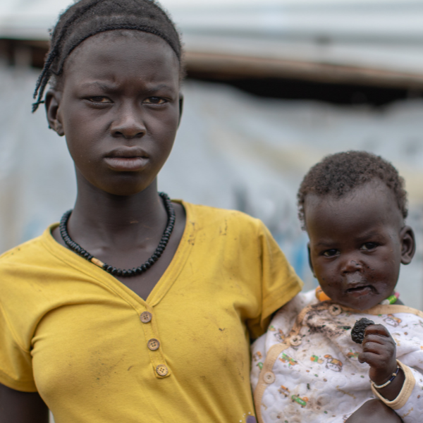 Sarah with her sibling - orphan