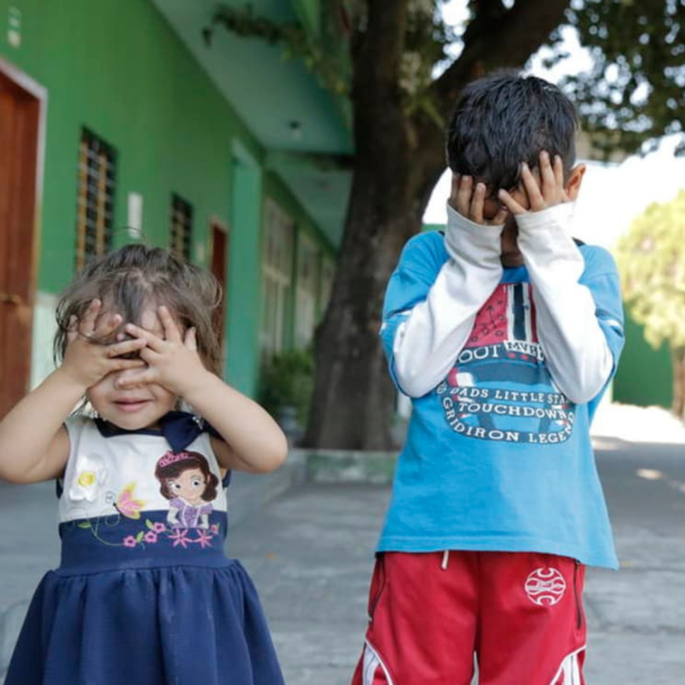 Children Refugees in Mexico hiding their faces.