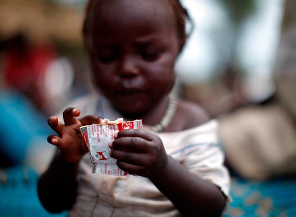 kid with food