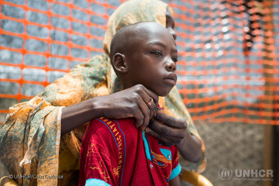 refugee child and his mother from Sudan, Tchad, 2023