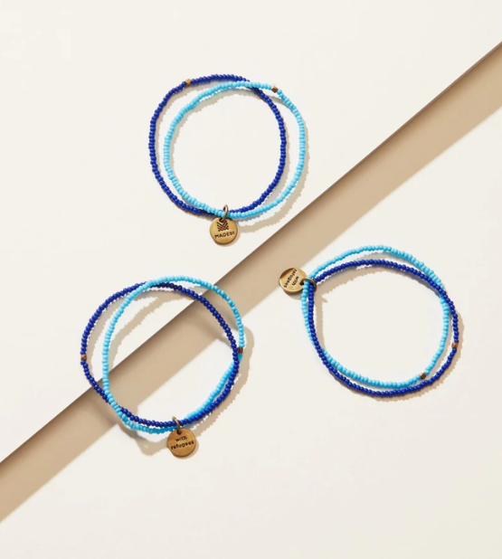 For monthly donations of HKD 240 or above, or one-time donations of HKD 3000 or above, you will receive a "#WithRefugee" Bracelet crafted by refugees as a symbol of solidarity that shows the world you stand with refugees.