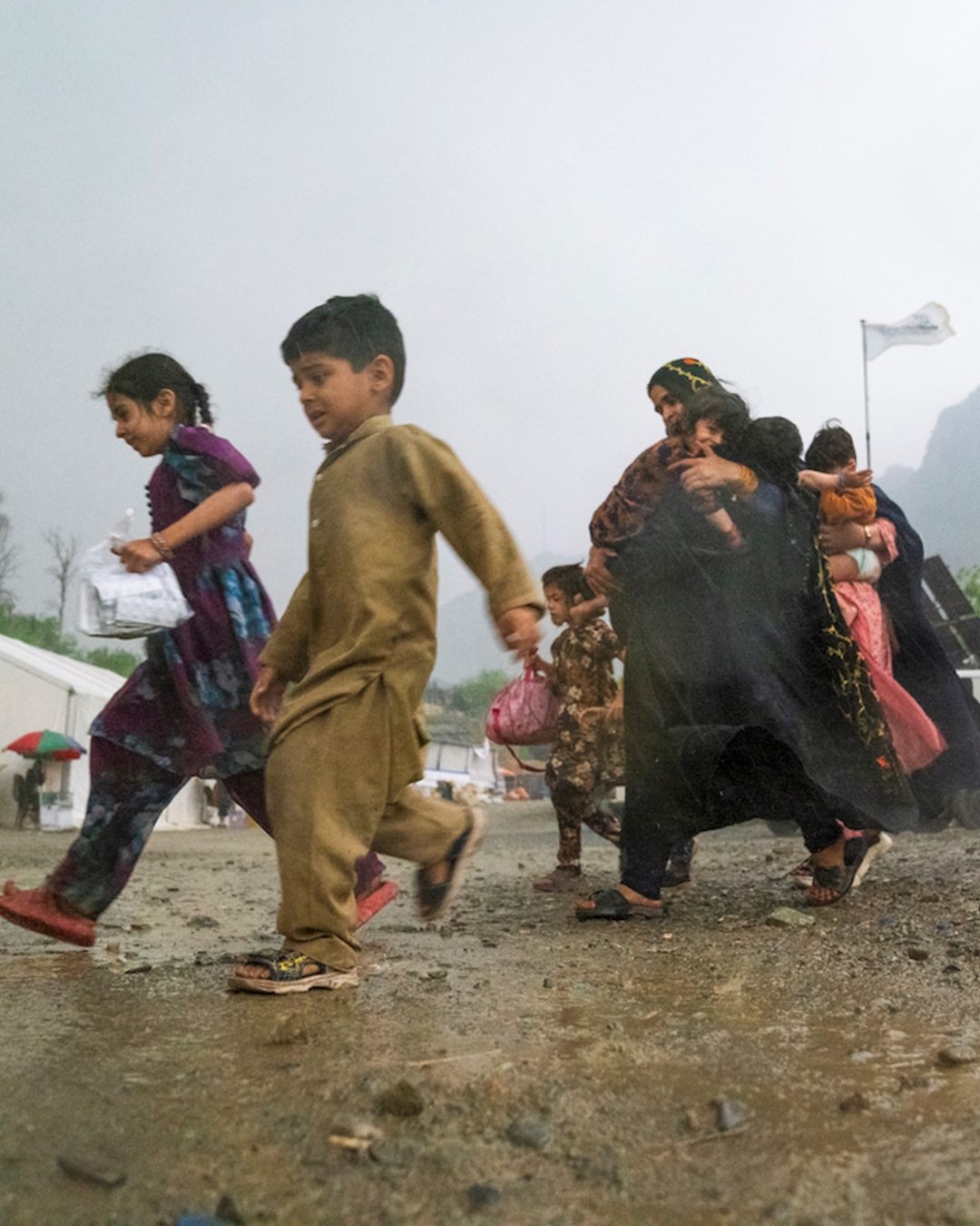 afghan children and families at the Torkham border area receive assistance from UNHCR including emergency cash for food and essential items.