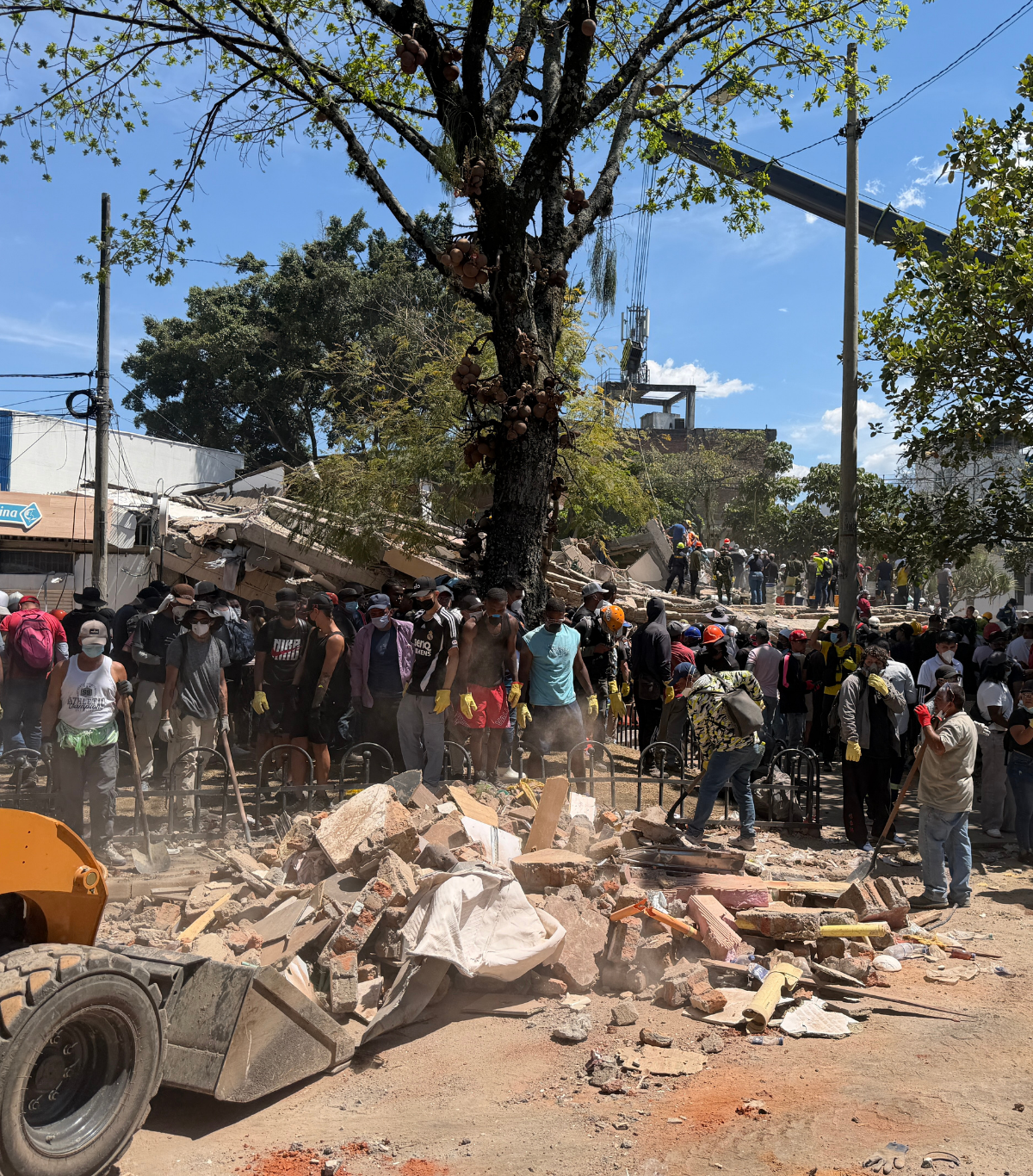 Damaged buildings in Colombia following the August 2026 earthquake, with structures partially collapsed and impacted communities in affected areas.