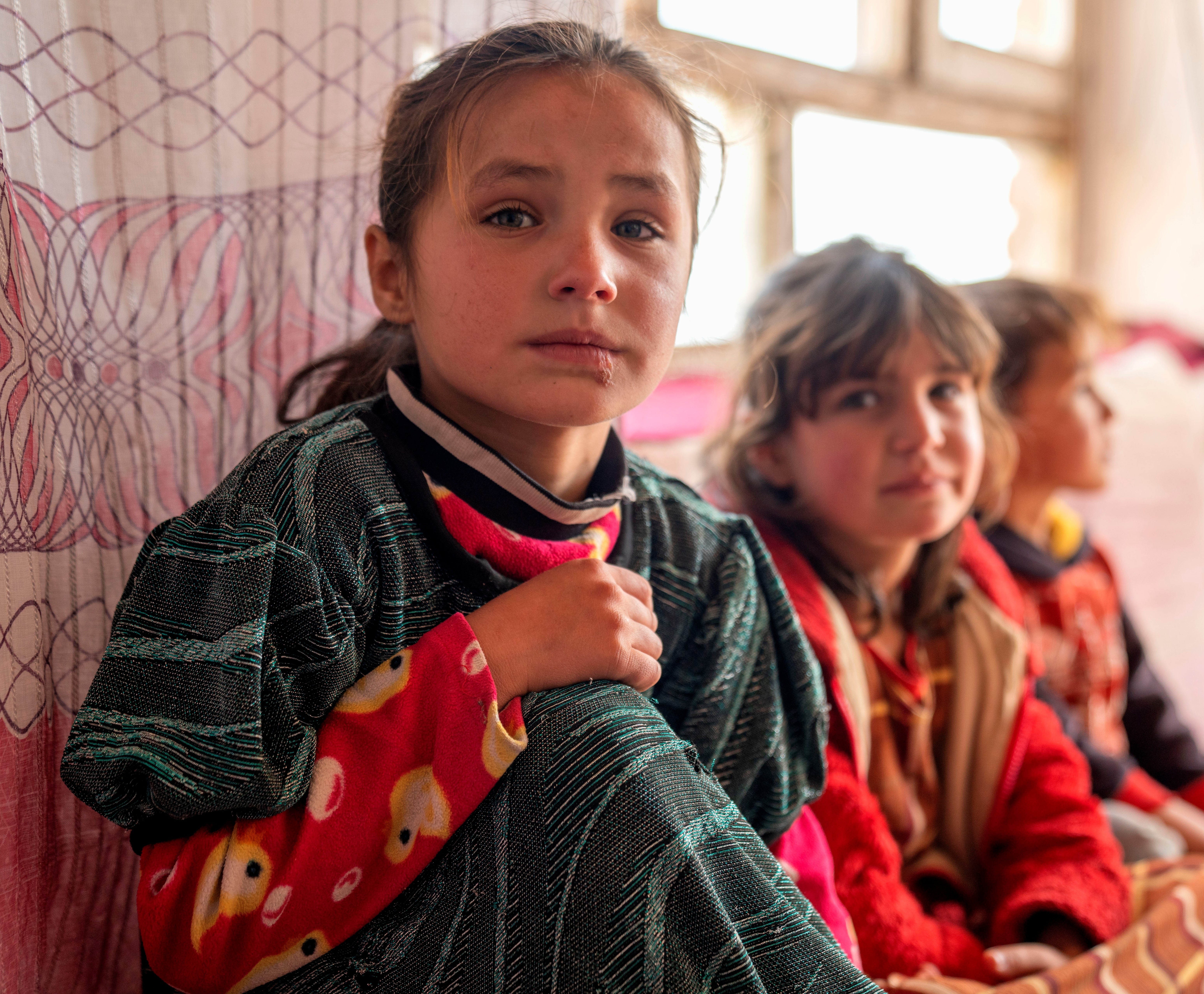 Behtar, 8, left, lives with her mother, sister, and two brothers in Lowai Baba Jan, PD11, Kabul, Afghanistan.