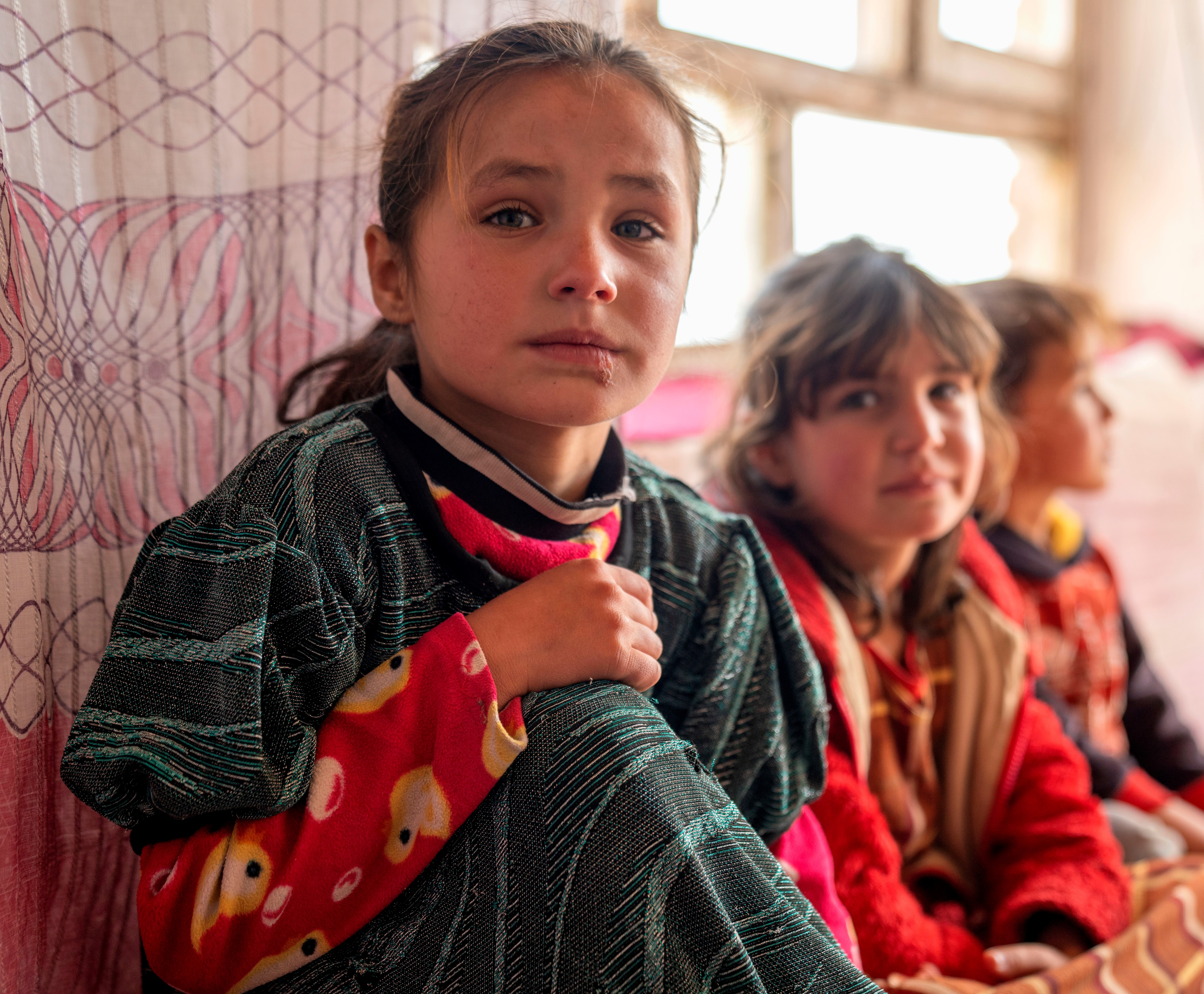 UNHCR: Afghanistan Emergency Behtar, 8, left, lives with her mother, sister, and two brothers in Lowai Baba Jan, PD11, Kabul, Afghanistan.