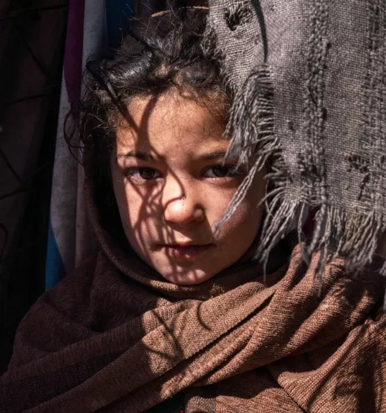Afghan child in Afghanistan Program Assists IDPs from Kunduz